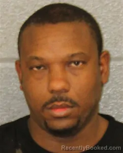 Mugshot of OCAREY PHILLIP-LLOYD HARRISON booked in Mecklenburg County, North Carolina on March 22, 2026