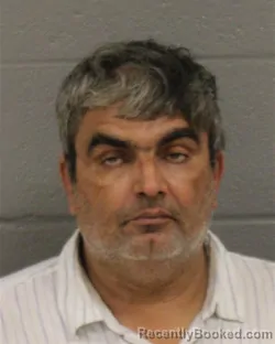 Mugshot of ASFAND ALI booked in Mecklenburg County, North Carolina on March 22, 2026