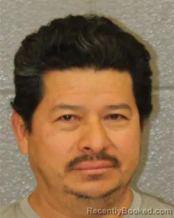 Mugshot of PEDRO ANTONIO BANOS-FUENTES booked in Mecklenburg County, North Carolina on March 22, 2026