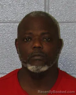 Mugshot of JULIUS ALIEU TATE booked in Mecklenburg County, North Carolina on March 23, 2026