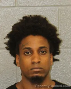 Mugshot of KUDREKUIS MONYALE CARTER booked in Mecklenburg County, North Carolina on March 23, 2026