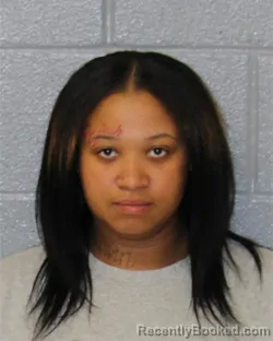 Mugshot of CHINYA FAYE SANDERS booked in Mecklenburg County, North Carolina on March 23, 2026