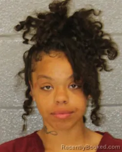 Mugshot of ARMANI BEAUTIFUL ESPINO booked in Mecklenburg County, North Carolina on March 23, 2026