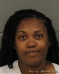 Mugshot of OCTAVIA NICOLE NESBIT booked in Mecklenburg County, North Carolina on March 24, 2026