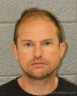 Mugshot of JOSHUA JAMES LEWALLEN booked in Mecklenburg County, North Carolina on March 24, 2026