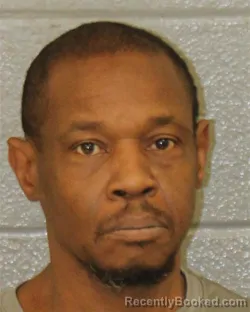 Mugshot of BRYAN OKIETH ALSBROOKS booked in Mecklenburg County, North Carolina on March 24, 2026