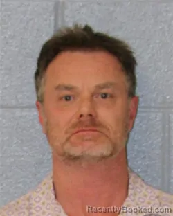 Mugshot of JOHN CHARLES ROSS booked in Mecklenburg County, North Carolina on March 24, 2026