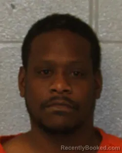 Mugshot of KENNETH DEVON GREEN booked in Mecklenburg County, North Carolina on March 25, 2026