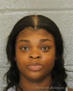 Mugshot of DYNASTY DENISE TAYLOR booked in Mecklenburg County, North Carolina on March 25, 2026