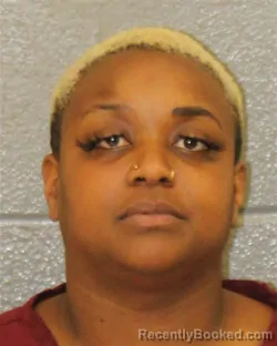 Mugshot of DAGEA BRIANN CARRAWAY booked in Mecklenburg County, North Carolina on March 26, 2026