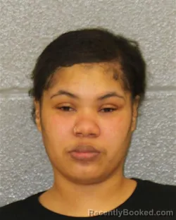 Mugshot of NAUTICA ANTOINETTE MORRIS booked in Mecklenburg County, North Carolina on March 26, 2026