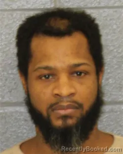 Mugshot of TYRONE ARNEZ WALKER booked in Mecklenburg County, North Carolina on March 26, 2026