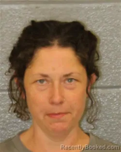 Mugshot of LAURA NELL REYNOLDS booked in Mecklenburg County, North Carolina on March 26, 2026