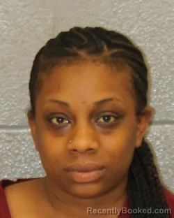 Mugshot of ENFINITY OJOHANE ROGERS booked in Mecklenburg County, North Carolina on March 26, 2026