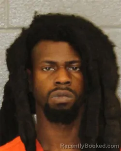 Mugshot of HENOLD KARIM JEAN booked in Mecklenburg County, North Carolina on March 26, 2026