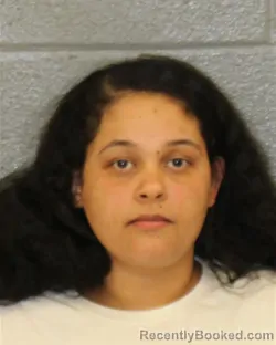 Mugshot of ASHA SHARIF ALI booked in Mecklenburg County, North Carolina on March 26, 2026