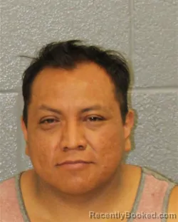 Mugshot of OSCAR CHIGO-DIAZ booked in Mecklenburg County, North Carolina on March 27, 2026