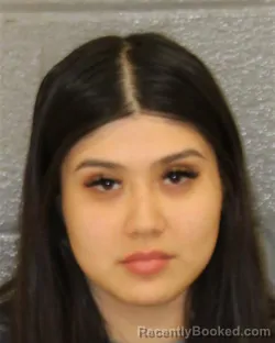 Mugshot of KIMBERLY RIVERA-VASQUEZ booked in Mecklenburg County, North Carolina on March 27, 2026