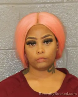 Mugshot of ZAMADIA ENEYCHE DOGGETTE booked in Mecklenburg County, North Carolina on March 28, 2026