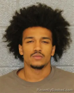 Mugshot of JOHNATHON CLAYTON booked in Mecklenburg County, North Carolina on March 29, 2026