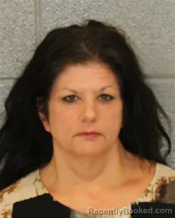 Mugshot of JUDITH RENEE ADAMS booked in Mecklenburg County, North Carolina on March 30, 2026