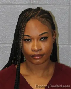 Mugshot of SABRA HANSON booked in Mecklenburg County, North Carolina on March 30, 2026