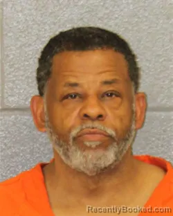 Mugshot of GREGORY LOVETTE HOLMES booked in Mecklenburg County, North Carolina on March 31, 2026