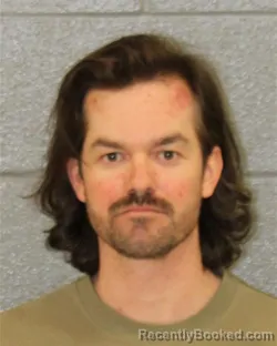 Mugshot of CODY KENT STAUFFER booked in Mecklenburg County, North Carolina on April 1, 2026