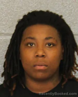 Mugshot of KIONA MONAE JOHNSON booked in Mecklenburg County, North Carolina on April 1, 2026