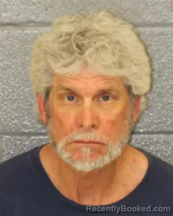 Mugshot of MICHAEL CRAIG MOORE booked in Mecklenburg County, North Carolina on April 1, 2026