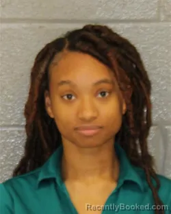 Mugshot of KENDALL YVETTE WASHINGTON booked in Mecklenburg County, North Carolina on April 1, 2026