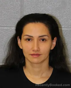 Mugshot of MIRNA MIRANDA-DERAS booked in Mecklenburg County, North Carolina on April 1, 2026