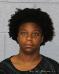 Mugshot of KALAURA MONIQUE JONES booked in Mecklenburg County, North Carolina on April 1, 2026