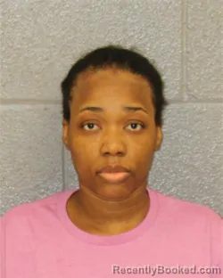 Mugshot of OLNA INDIGENE booked in Mecklenburg County, North Carolina on April 3, 2026