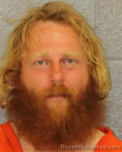 Mugshot of JASON MATTHEW LENNON booked in Mecklenburg County, North Carolina on April 3, 2026