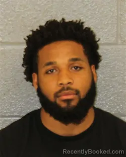 Mugshot of DESMON TAYLOR MOORE booked in Mecklenburg County, North Carolina on April 4, 2026