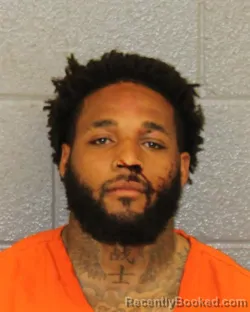 Mugshot of DEVEN TYLER MOORE booked in Mecklenburg County, North Carolina on April 4, 2026