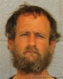 Mugshot of JOSHUA PAUL AHLGREN booked in Mecklenburg County, North Carolina on April 4, 2026