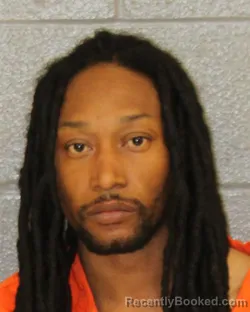 Mugshot of DE'VOUGHN KAMERON HENDERSON booked in Mecklenburg County, North Carolina on April 4, 2026