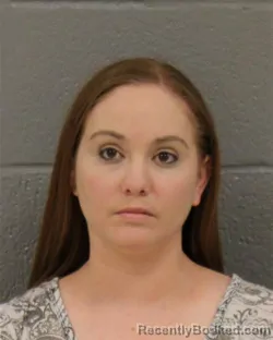 Mugshot of AMBER FAYE PARKER booked in Mecklenburg County, North Carolina on April 4, 2026