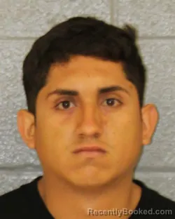 Mugshot of ROBELL JIMENEZ ALVAREZ booked in Mecklenburg County, North Carolina on April 5, 2026