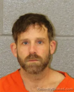 Mugshot of IAN MCCRAY HAYES booked in Mecklenburg County, North Carolina on April 25, 2026