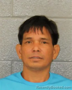 Mugshot of YBINH RMAH booked in Mecklenburg County, North Carolina on April 26, 2026