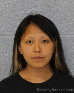 Mugshot of AMY YANG booked in Mecklenburg County, North Carolina on April 26, 2026