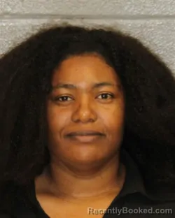 Mugshot of DESIREE MICHELE WALTERS booked in Mecklenburg County, North Carolina on May 14, 2026