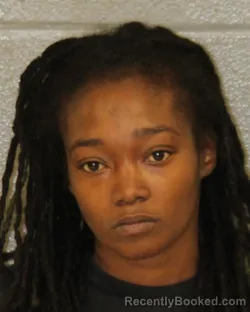 Mugshot of JEZMYNE V THOMAS booked in Mecklenburg County, North Carolina on May 14, 2026