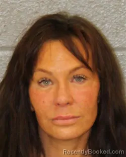 Mugshot of LAURA MERRIMAN WOOTTON booked in Mecklenburg County, North Carolina on May 17, 2026