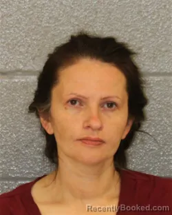 Mugshot of NADIA G SYRN booked in Mecklenburg County, North Carolina on May 18, 2026