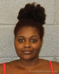 Mugshot of BRIANA MONE ISSAC booked in Mecklenburg County, North Carolina on May 18, 2026