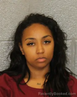 Mugshot of ADELAIDA DESTINY MASSO booked in Mecklenburg County, North Carolina on May 19, 2026